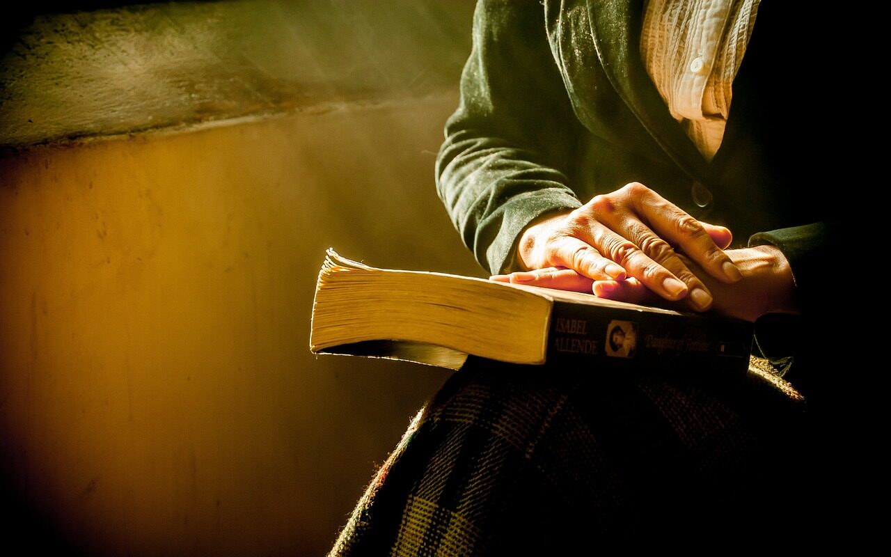 book, woman, hands